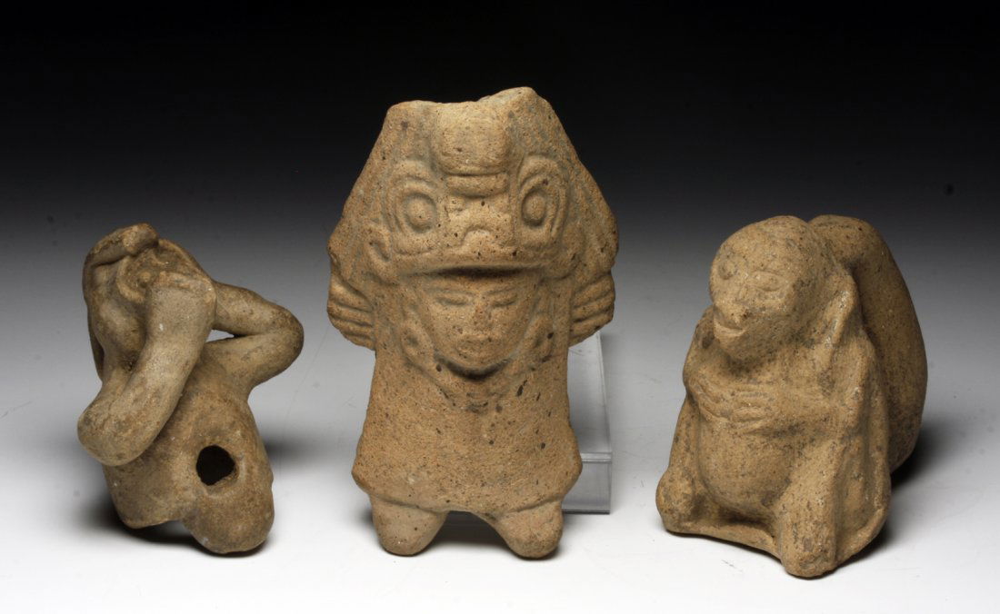 Three Mayan Objects - All Whistles: Pre-Columbian, Mayan territories, Ca 500 to 800 CE. Set of three very delightful molded pottery whistles. First is a finger ring in the form of a monkey, whistle at reverse. Next is a standing Mayan l