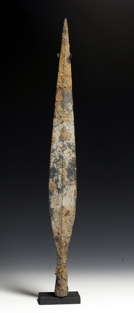 Remarkably Well-Preserved Roman Iron Spear: Roman, 2nd to 3rd centuries CE. Long iron spear of the type used by the Roman Auxiliary legions. Central ridge and short socket, the middle section remarkably free of rust, whereas the tip and base wi