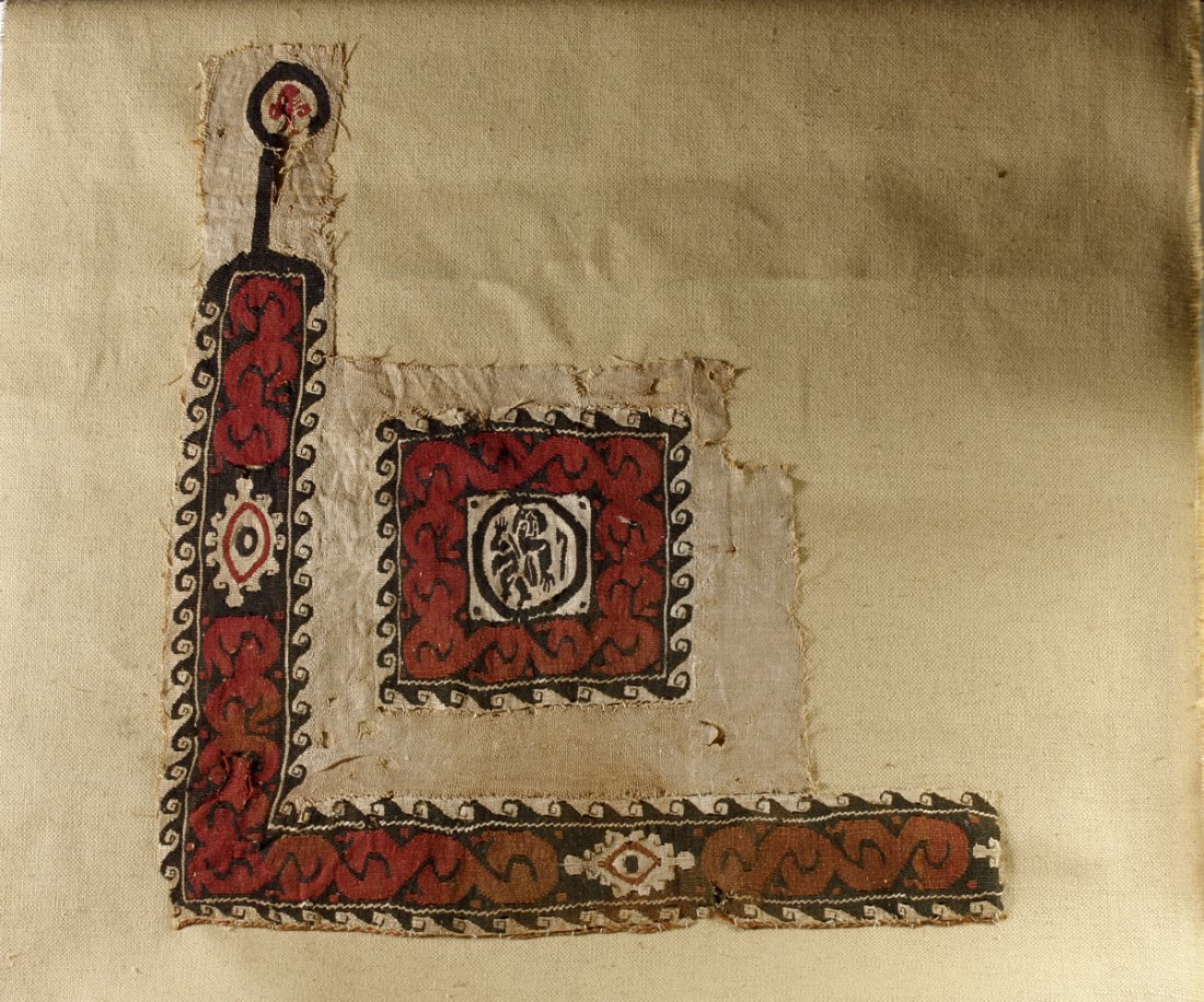 Large Coptic Textile Fragment: One of the largest and finest examples of Coptic textiles we have seen outside of major museums! Egyptian, ca 5th to 9th century AD. Tightly woven linen with large section of red on black border and l