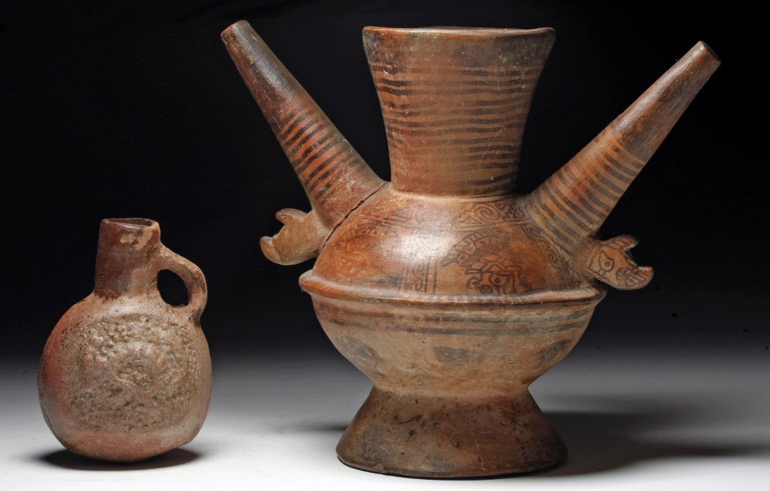 Pair of Pre-Columbian Lambayeque Pottery Jars: Northern Peru, Ca 800 to 1100 CE. Lovely pair of redware pottery jars. First, twin spouted jar, crab claws under each spout representing Nylamp - god of the underworld. Jar painted with 4 panels of wa