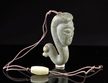 Serpentine Pendant: Human Face & Duck Head Motif
