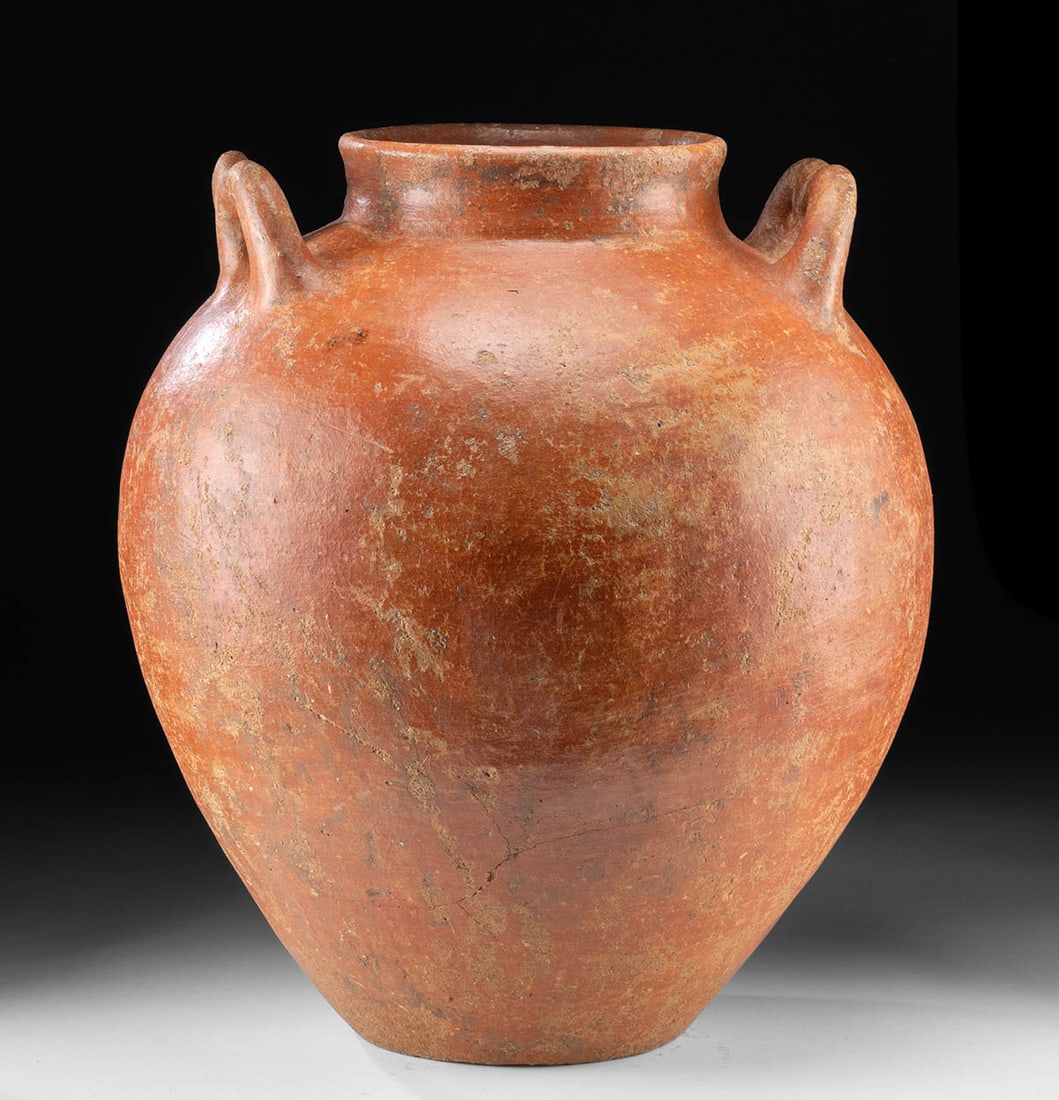 Huge Hellenistic Redware Storage Jar, ex-Arte Primitivo: Ancient Greece, Hellenistic Period, ca. 3rd to 1st century BCE. An immense redware storage jar with a broad ovoid body, short neck, and distinctive twin m-shaped loop handles set high on the shoulder.