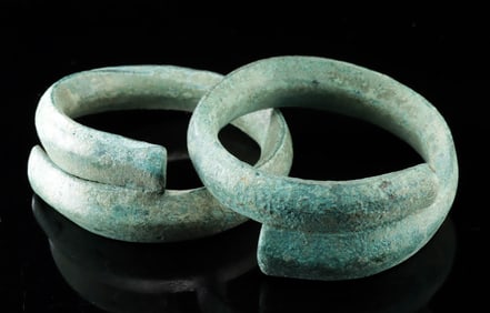 Pair of Dong Son Bronze Coiled Arm Cuffs