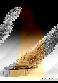 19th C. Meiji Walrus Ivory Okimono - Woman Holding Rabbit: East Asia, Japan, Meiji Period, ca. 19th to century CE. A charming okimono figure carved from walrus ivory, inlaid with nacre and enamel, depicting a smiling woman cradling a small rabbit in her arms.