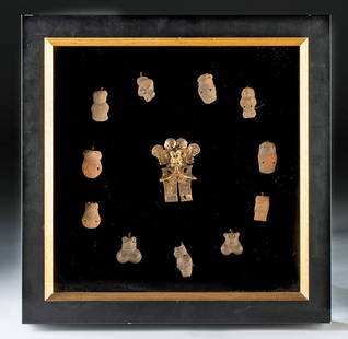 Sinu Tumbaga Pendant + 11 Zoomorphic Pottery Ocarinas: Pre-Columbian, Colombia, Sinu culture, ca. 500 to 900 CE. A captivating display centered on a Sinu tumbaga (gold-copper alloy) figural pendant of highly stylized form, surrounded by eleven miniature