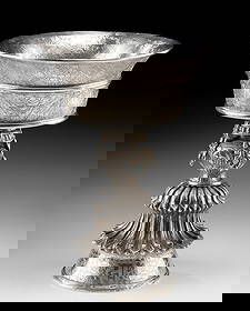 Tibetan Silver Plated Butter Lamp w/ Auspicious Symbols: Central Asia, Tibet, ca. early to mid-20th century CE. A finely crafted Buddhist yak butter lamp plated with a high-quality silver, adorned with turquoise inlays along the neck. Shaped like a chalice,