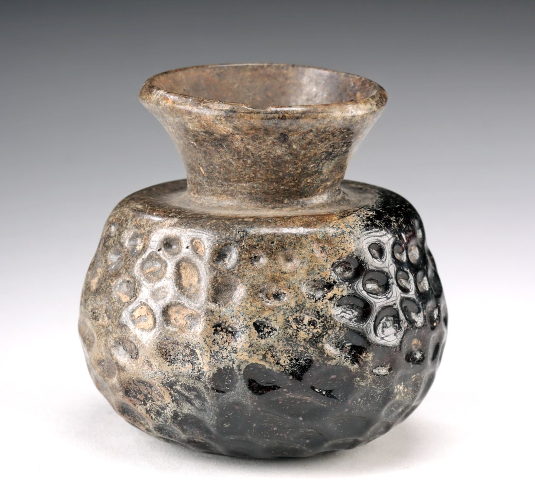 Late Roman / Byzantine Dimpled Glass Sprinkler Flask: **Originally Listed At $350** Roman, late Imperial Period to early Byzantine, ca. 4th to 6th century CE. A charming and well-preserved dimpled glass sprinkler flask, free-blown into a rounded body wit