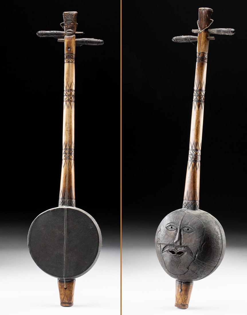 Indonesian Bone & Wood Rebab Stringed Instrument: **Originally Listed At $200** Southeast Asia, Indonesia, Bali/Java, ca. mid to late 20th century CE. A stringed instrument known as a rebab, crafted from bovine bone and wood with an animal bladder sk
