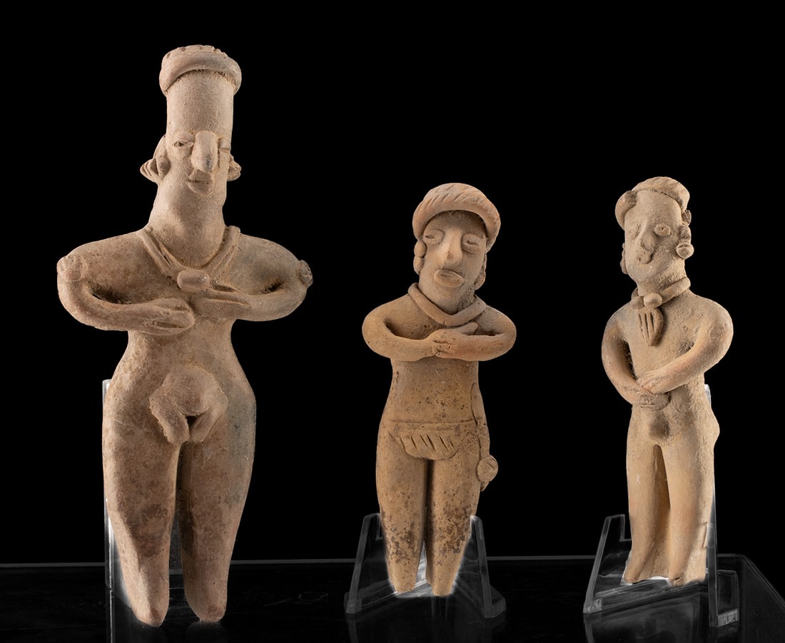 Colima Pottery Flat Figures - 2 Nude, 1 Clothed: **Originally Listed At $300** Pre-Columbian, West Mexico, Colima, ca. 300 BCE to 300 CE. A set of 3 hand-built pottery figures standing atop arched feet. The first figure is clothed in an incised skir