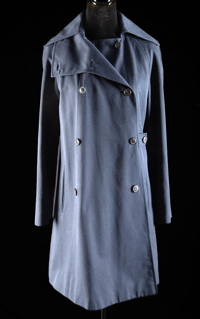 Brioni Navy Wool Double-Breasted Overcoat: Made in Italy, ca. 1998-2004. A refined navy double-breasted overcoat by Brioni, crafted in Italy from a luxurious mid-weight wool suiting cloth. The coat features structured shoulders, classic wide n