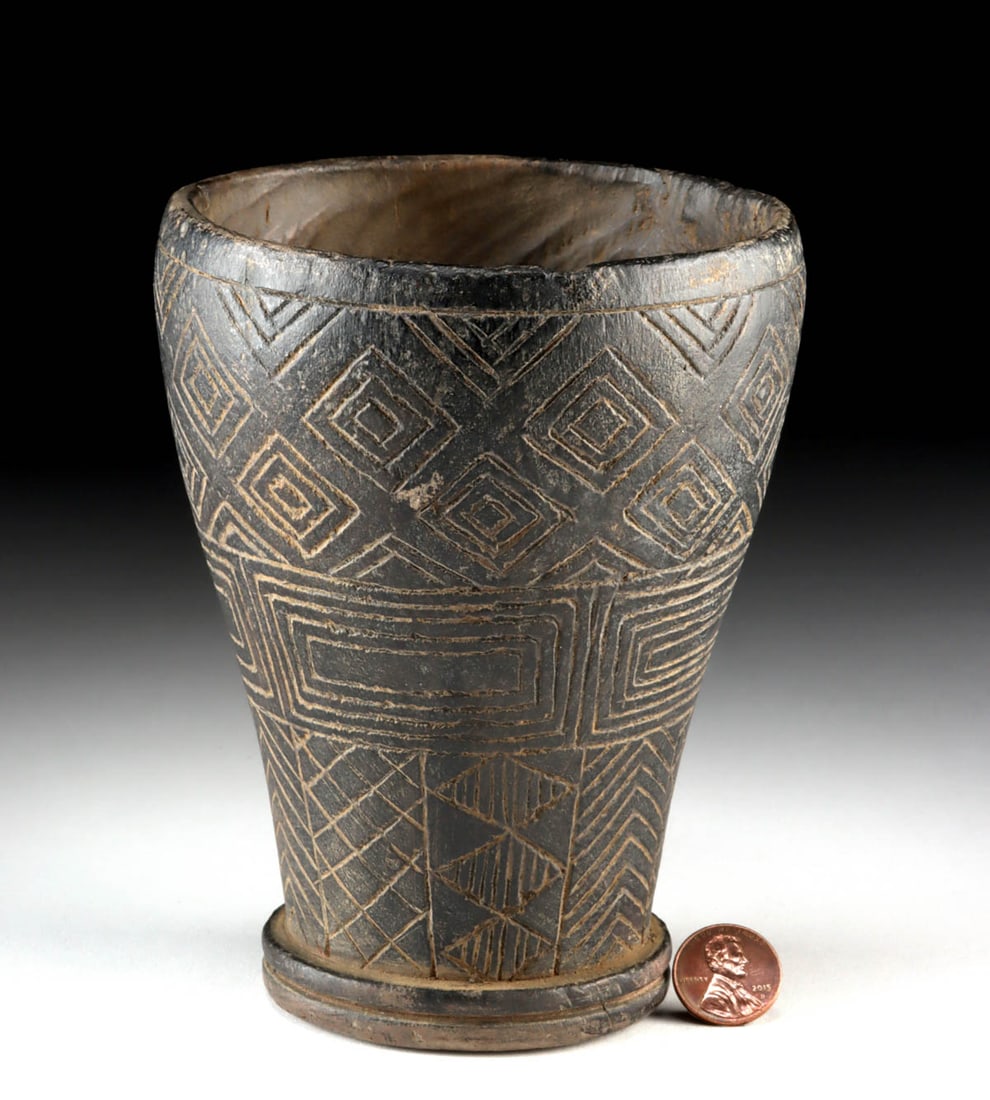 Inca Wooden Kero - Incised Geometric Design: Pre-Columbian, Central Andes, Inca Empire, ca. 1400 to 1530 CE. A wooden kero of handsome presence, its dark surface alive with the rhythm of incised geometry that once animated the highland courtly w