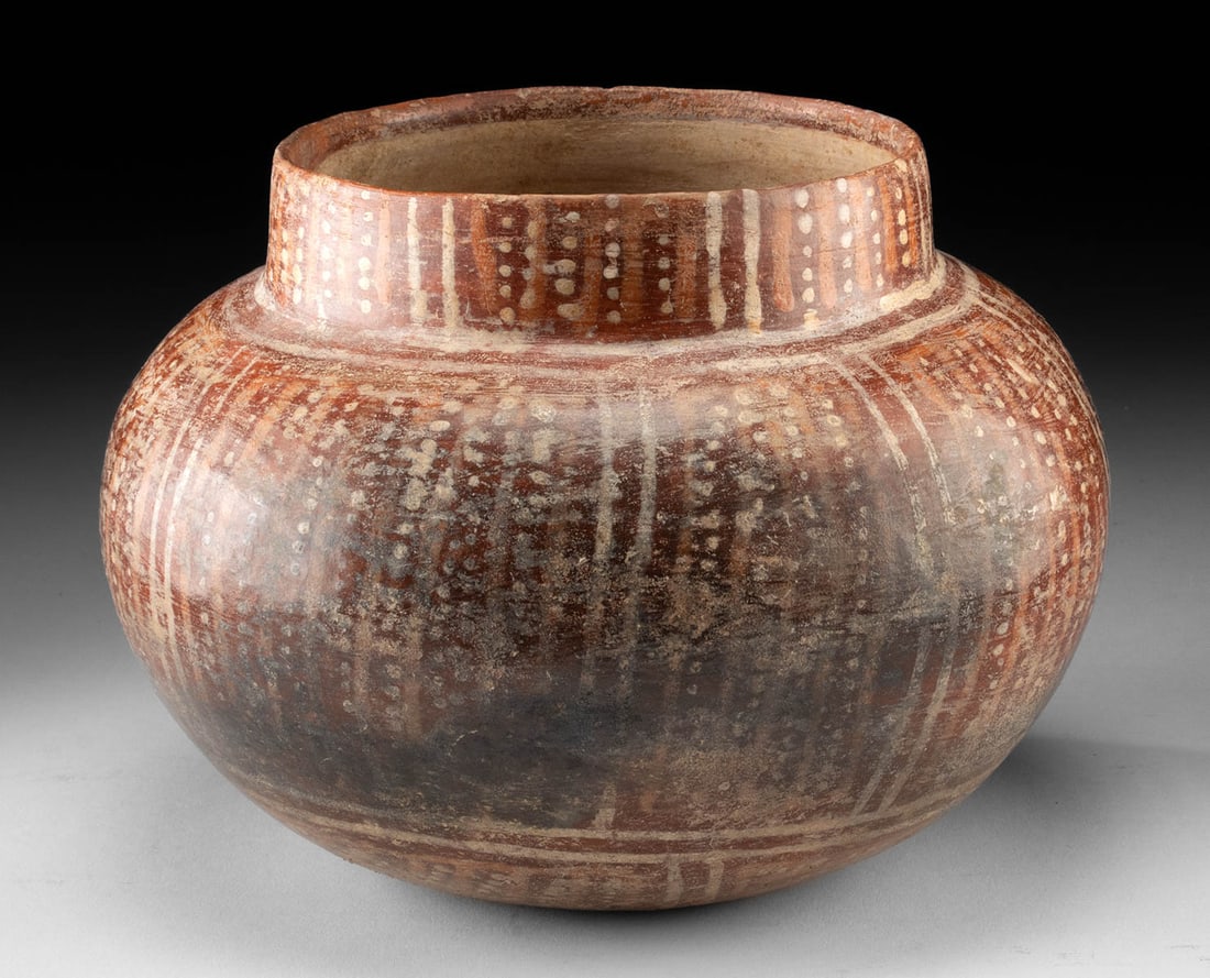 Ancient Michoacan Polychrome Striped Pottery Jar: Pre-Columbian, West Mexico, Michoacan region, Chupicuaro to Tarascan culture, ca. 300 BCE to 1300 CE. Globular redware jar with a short neck and rounded shoulder, decorated in cream slip with vertical