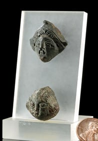 Two Romano-Celtic Copper-Lead Alloy Head Appliques