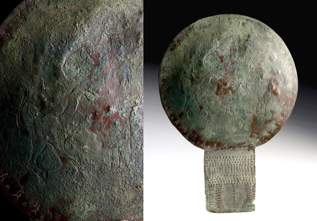 Ancient Near-East Engraved Bronze Mirror - Lion: Near East, eastern Anatolia or northern Syria, Early Iron Age, circa 10th?8th century BCE. Hammered from a single sheet of bronze and fitted with a rectangular tang for attachment to a now-lost handle