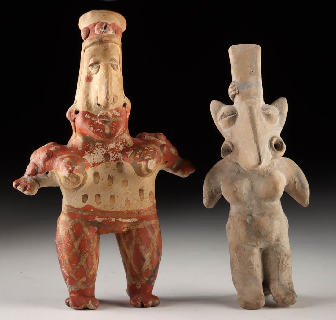 Jalisco Shaft Tomb Female Figurines (2), Standing Nude w/ Painted Motifs: Pre-Columbian, West Mexico, Jalisco, ca. 300 BCE to 300 CE. A lot of two Jalisco pottery standing nude female figures presents a striking study in form, symbolism, and regional sculptural convention.