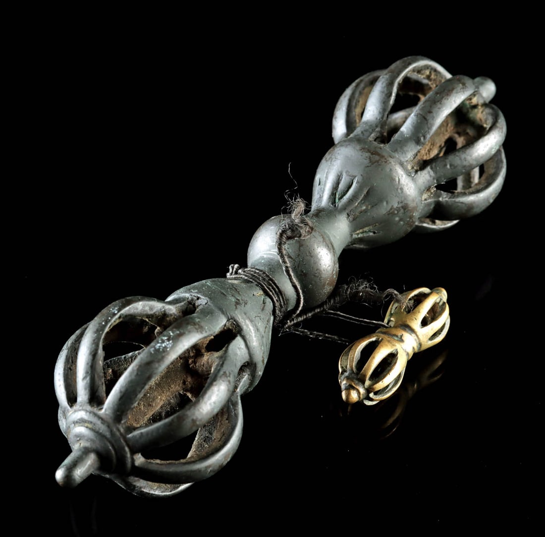 15th C. Tibetan Buddhist Bronze & Brass Double Dorjes: Central Asia, Tibet, ca. 15th to 18th century CE. A pair of bronze and brass double dorjes (vajra), sacred ritual implements symbolizing indestructibility, spiritual authority, and enlightened power i