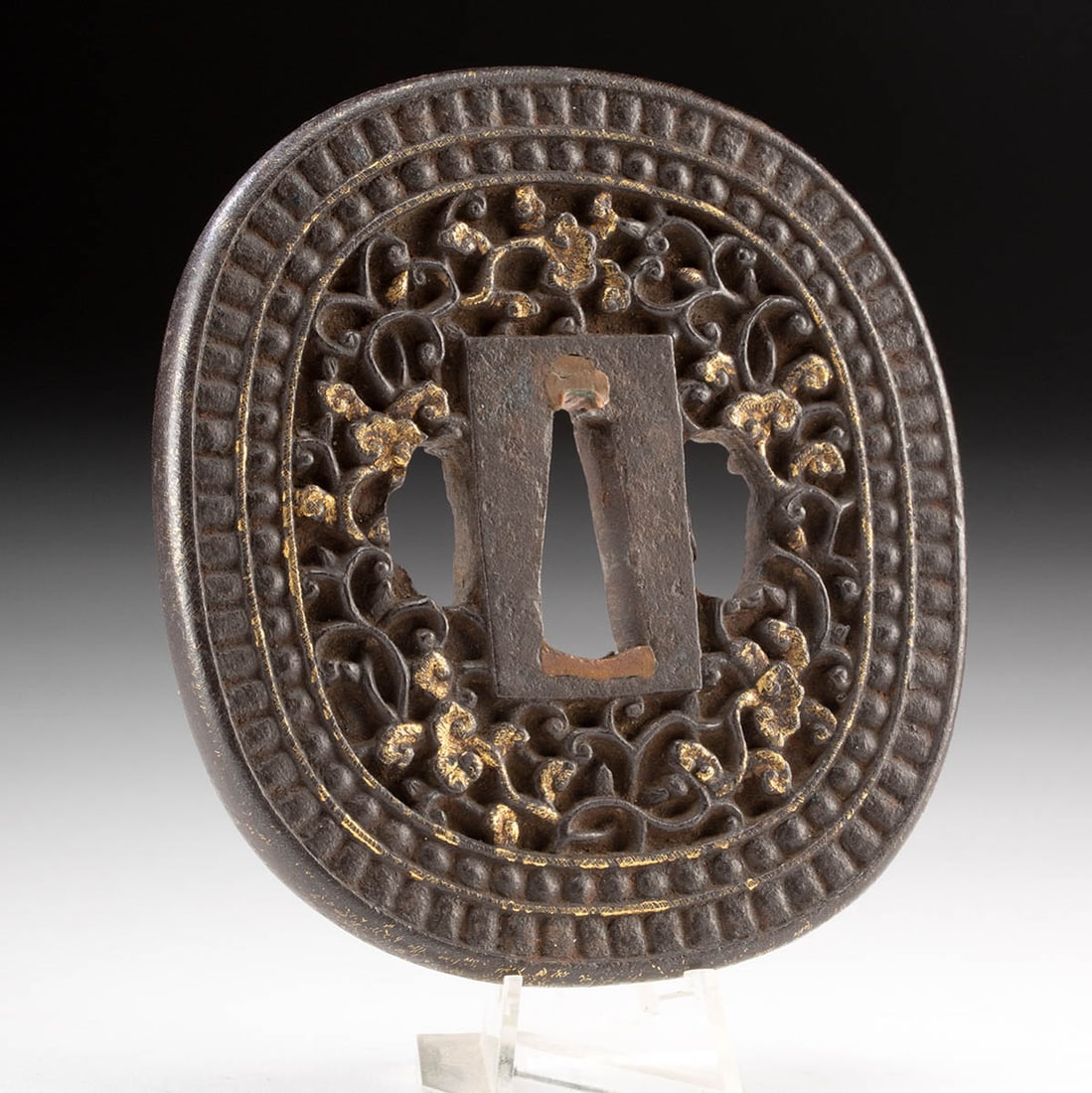 17th C. Japanese Gilt Iron Nanban Tsuba - Dragons: East Asia, Japan, Edo period, ca. 17th century CE. A finely wrought gilt iron nanban tsuba, distinguished by its intricate openwork (sukashi) design and cross-cultural flair. On one side, two sinuous