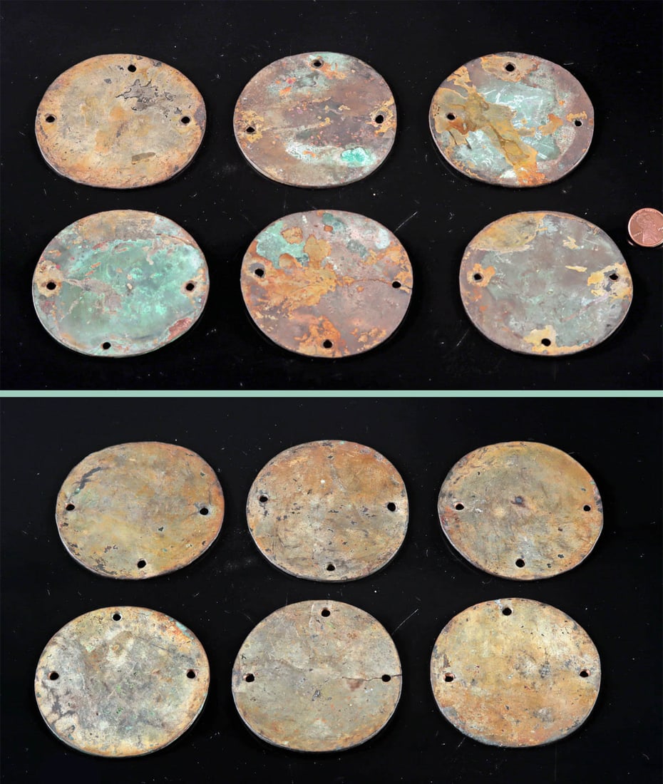 Six Large Chimu Gilt Copper Discs, Regalia Ornaments: Pre-Columbian, North Coast Peru, Chimu culture, ca. 800 to 1450 CE. A set of six large, hammered copper-alloy discs, each formed from thin sheet metal and originally polished to a bright, reflective s