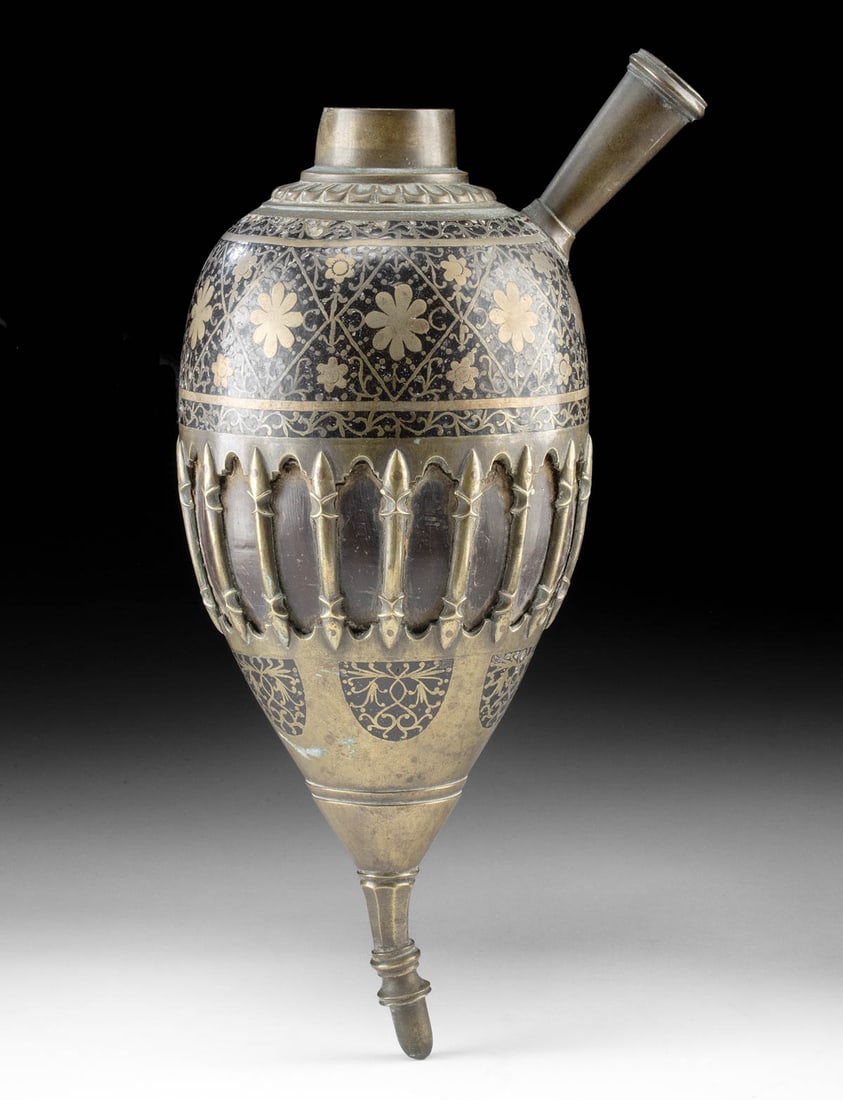 Persian 19th C. Qajar Silver Brass Qalyan Hookah Base: Near East / Central Asia, Persia (Iran), Qajar Dynasty, ca. 19th century CE. A brass ovoid base for a water pipe (hookah) vessel, known in Persian culture as a qalyan, composed of a coconut or calabas