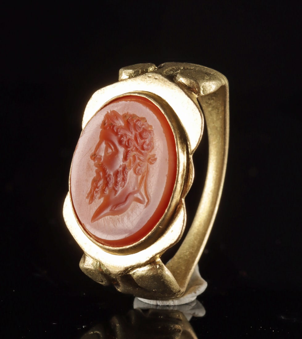 Neoclassical Gold Ring w/ Jasper Intaglio of Emperor: Europe, Neoclassical period, ca. 18th to 19th century CE. A splendid jasper intaglio of a bearded emperor in profile set in a gold ring of over 19 karats. Framed by a bushy beard and coiled coiffure,