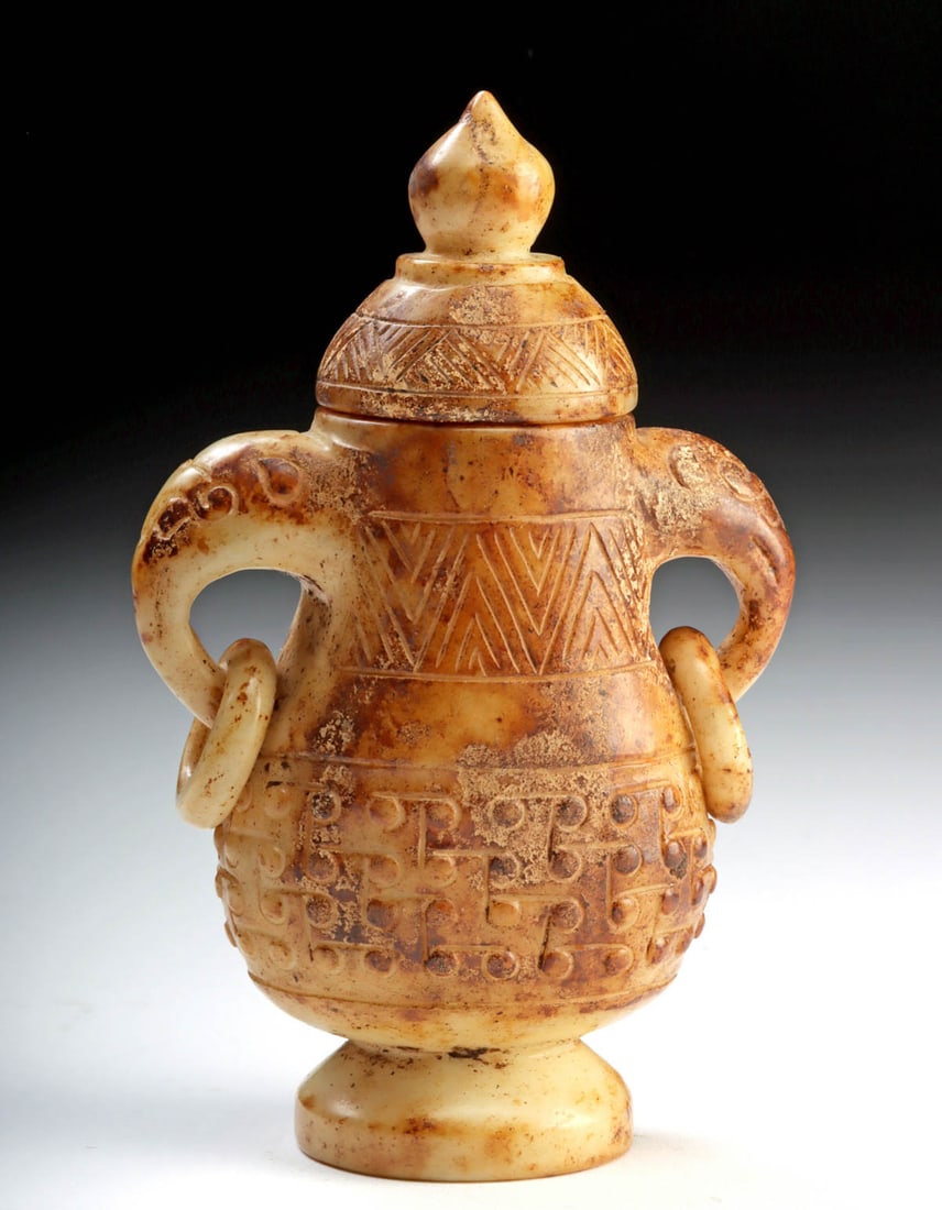 19th C. Qing Dynasty Archaistic Stone Lidded Jar: East Asia, Qing Dynasty, ca. 19th century CE. A finely carved stone jar modeled in the archaistic spirit of ancient Shang dynasty ritual bronzes, this elegant vessel balances scholarly revival with de