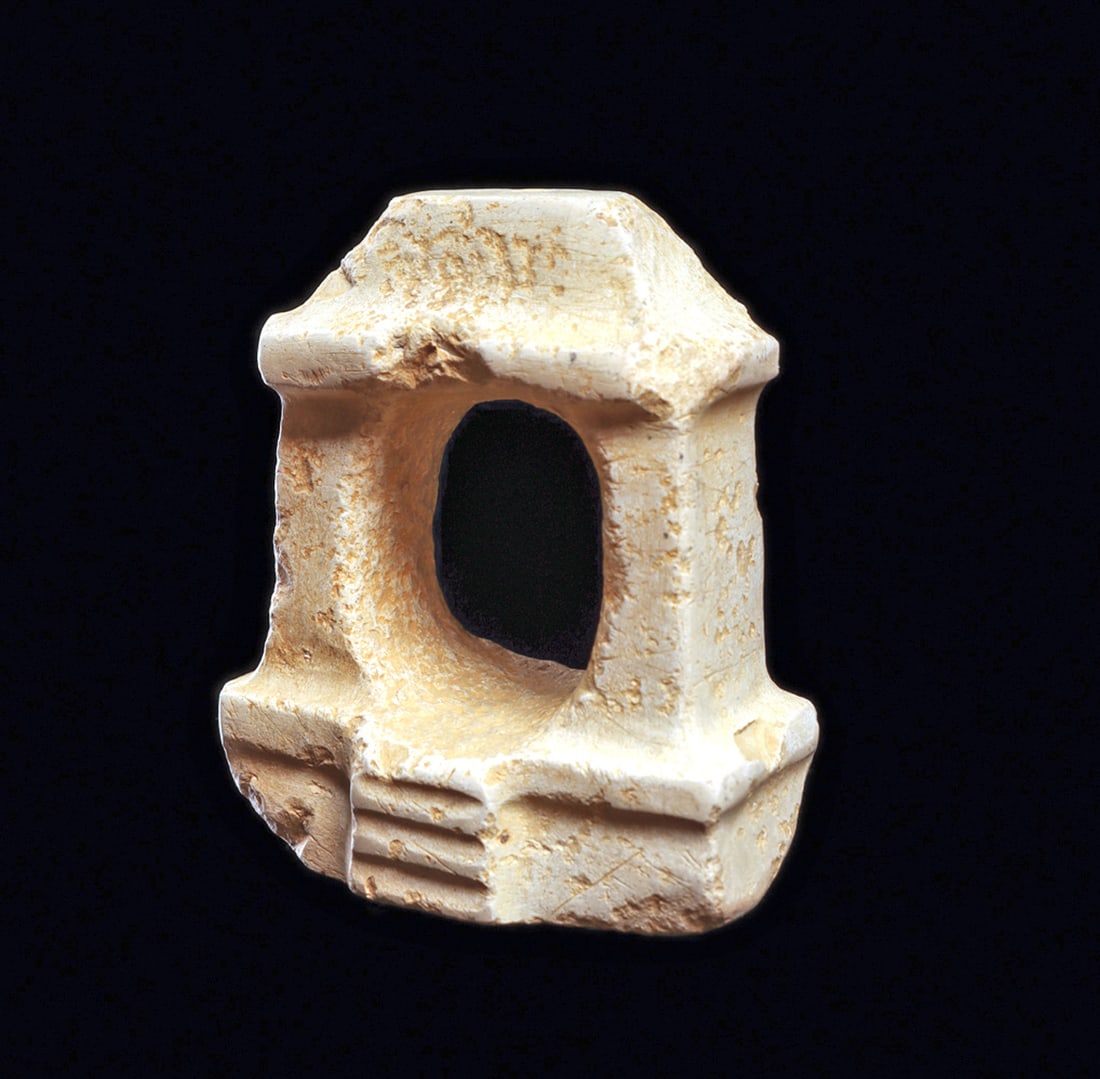 Mezcala Stone Temple: Carved cream-white stone double column votive temple having stairs in the front center leading up to a rectangular platform. Stepped lintel at the top, biconical drilled suspension hole in top center,