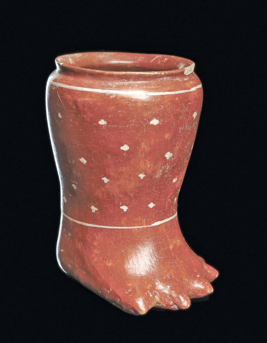 Chinesco Foot Vessel: Redware pottery lower leg/foot vessel having five pointy toes and collared rim. Red glazed surface with fine white painted upper and lower bands with scattered rows of simple white crosshatched elemen