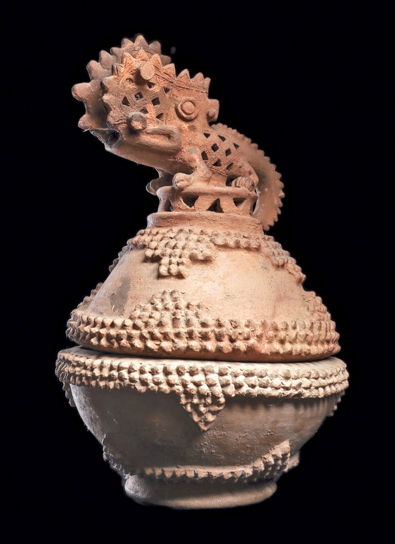 Nicoya-Guanacaste Lidded Incensario: Large pinkish-buff color pottery lidded incensario depicted with a large crocodilian effigy finial, with overall openwork in his body and head, which allowed the smoke to escape from the covered vesse