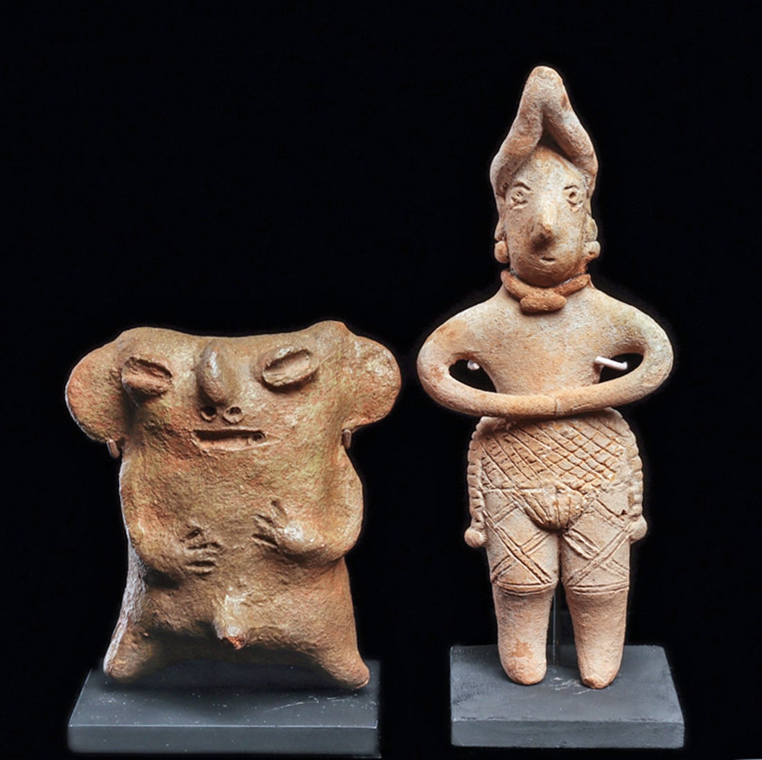 Vicus Miniature Male Figure & Colima Figure (2): Natural orange-tan pottery Vicus abstract nude male figure depicted with large c-shaped ears and coffee bean type eyes, holding his hands to his stomach. Intact. Custom metal base. Together with a sol