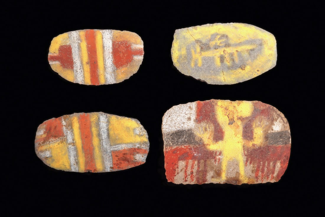 Chucu / Inca Painted Votive Stones (4): Four different hardstone painted votive examples, including two of similar striped and geometric decoration. Together with an example depicting a standing human figure with raised hands on a geometric
