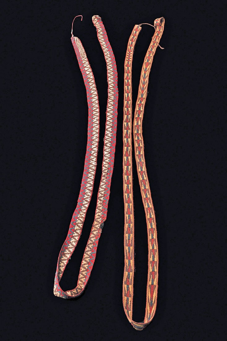 Chimu / Inca Decorated Textile Belts (2): Two different woven textile belts, the narrower example having a four color geometric/chevron and interlocking stepped design. Finished at one end and having a simple string attachment. Together with