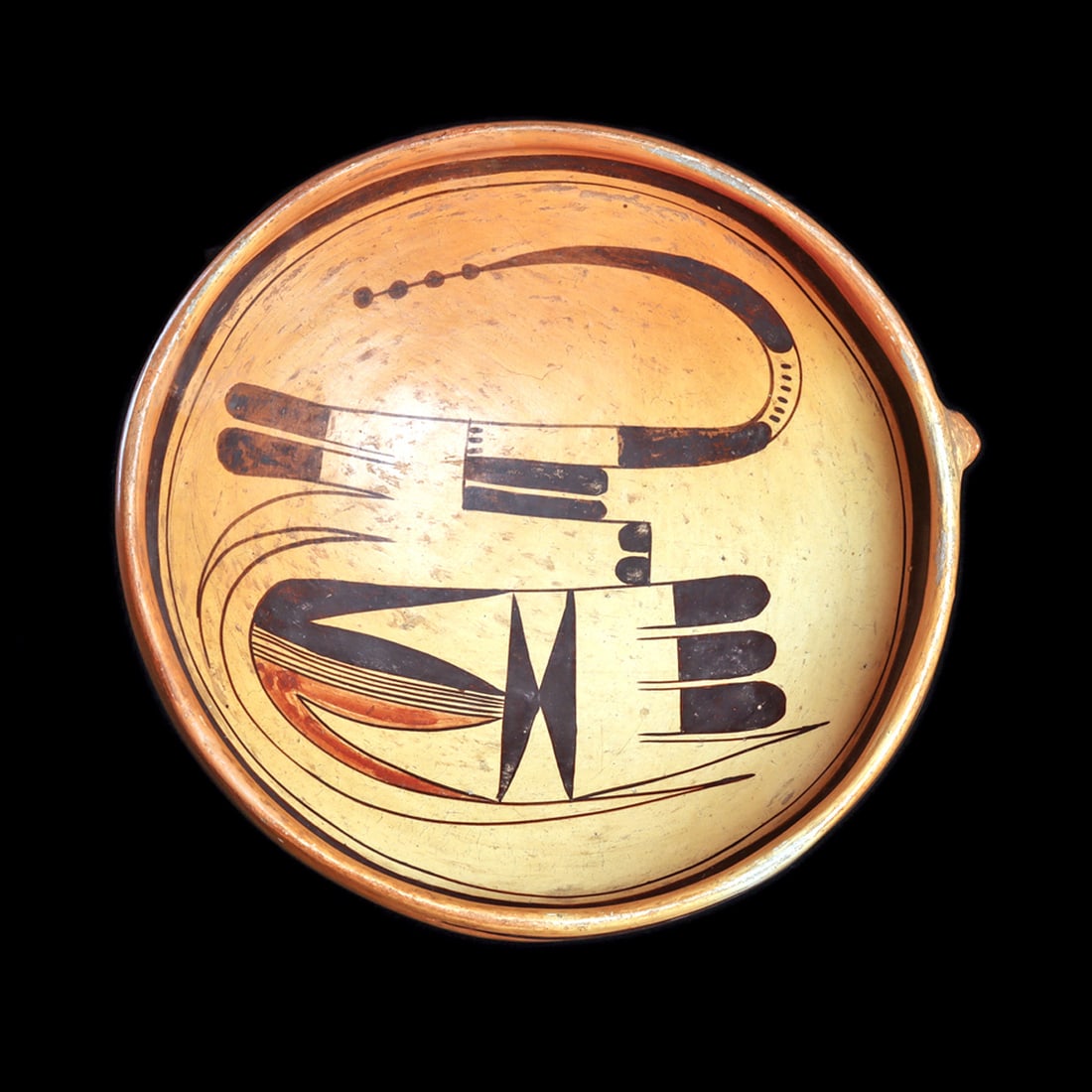 Hopi Nampeyo Feather Design Bowl: Hopi polychrome open bowl with a lug for hanging that was made by Nampeyo or a member of the Nampeyo family, possibly Annie, Nampeyo's daughter. The design is a classic abstracted bird often used by N