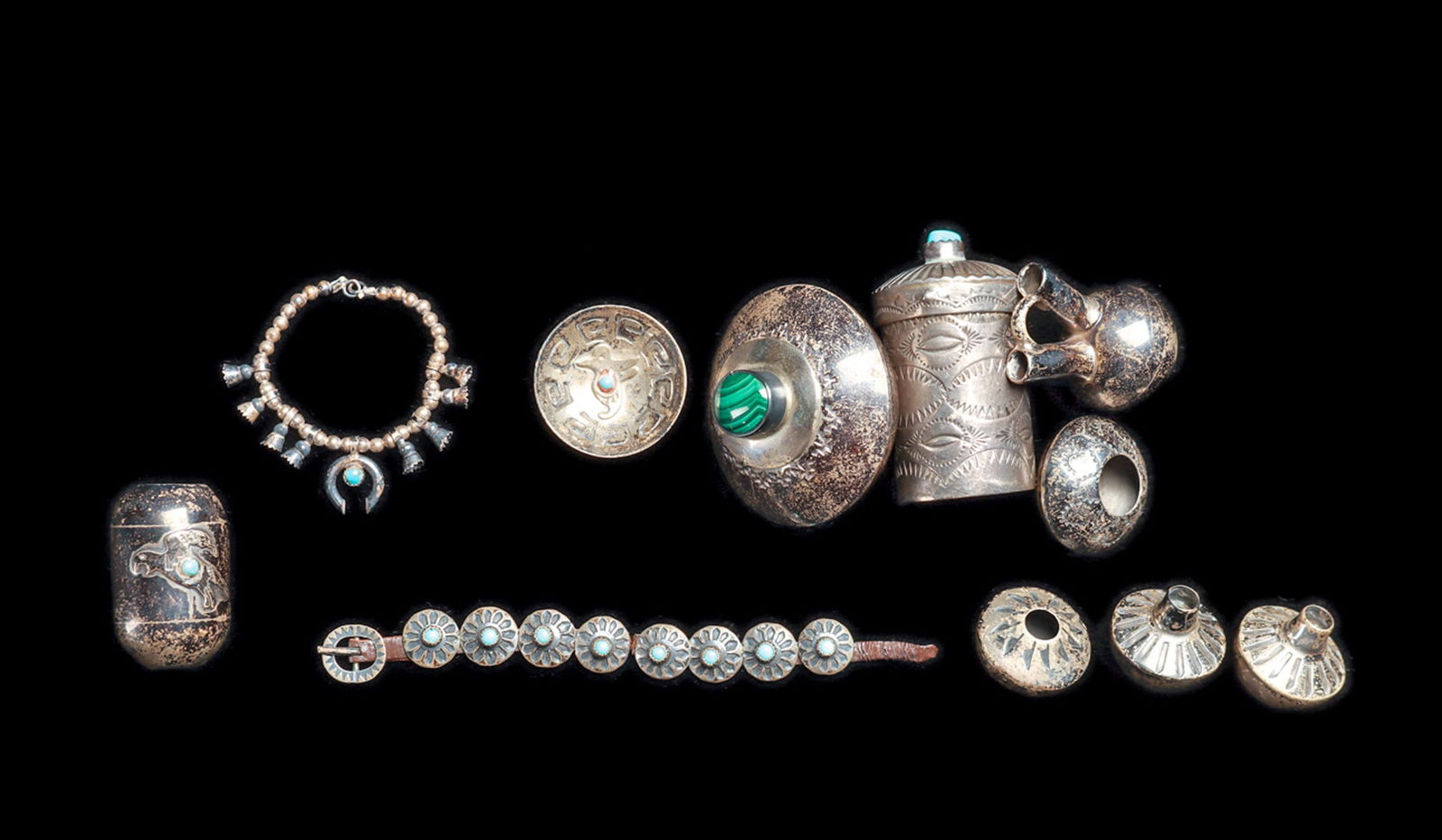 Navajo Miniature Silver Vessels & Jewelry (11): Group of eleven different finely detailed silver objects including two lidded examples, one set with a turquoise finial and the other with a malachite set finial. A cylinder vase set with two tiny tur
