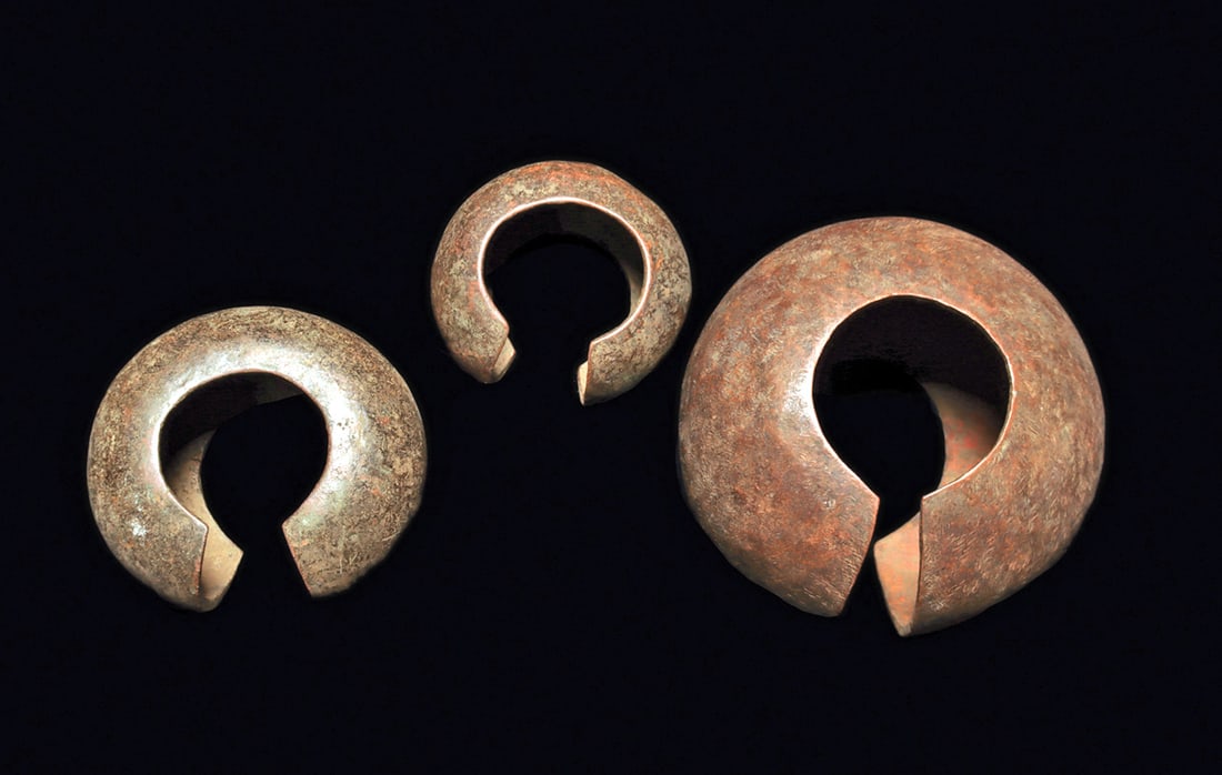 Mbole Currency Cuffs (3): Currency in form of spherical copper rings, worn as anklets by married women. Each of different size, the smallest one with higher copper content. 5-1/2 to 8-1/4"D. Provenance: Private New England co