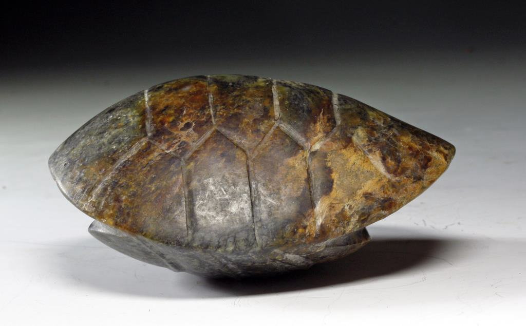 Old Chinese Jade Carving – Large Turtle Shell: China, 19th Century. Carved to resemble a turtle's shell. Large, heavy piece with incised detail on top and bottom, pierced through the middle. Measures approx. 4" x 3" Provenance: ex-private Arizona 
