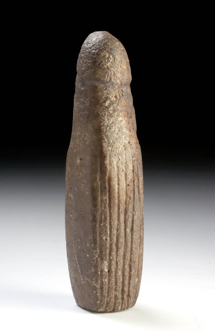 Costa Rican Stone Bark Beater - Phallic Form: Pre-Columbian, Central America, Costa Rica, Atlantic Watershed, ca. 700 to 1520 CE. A powerfully simplified stone bark beater, its elongated phallic form balancing utilitarian purpose with unmistakabl