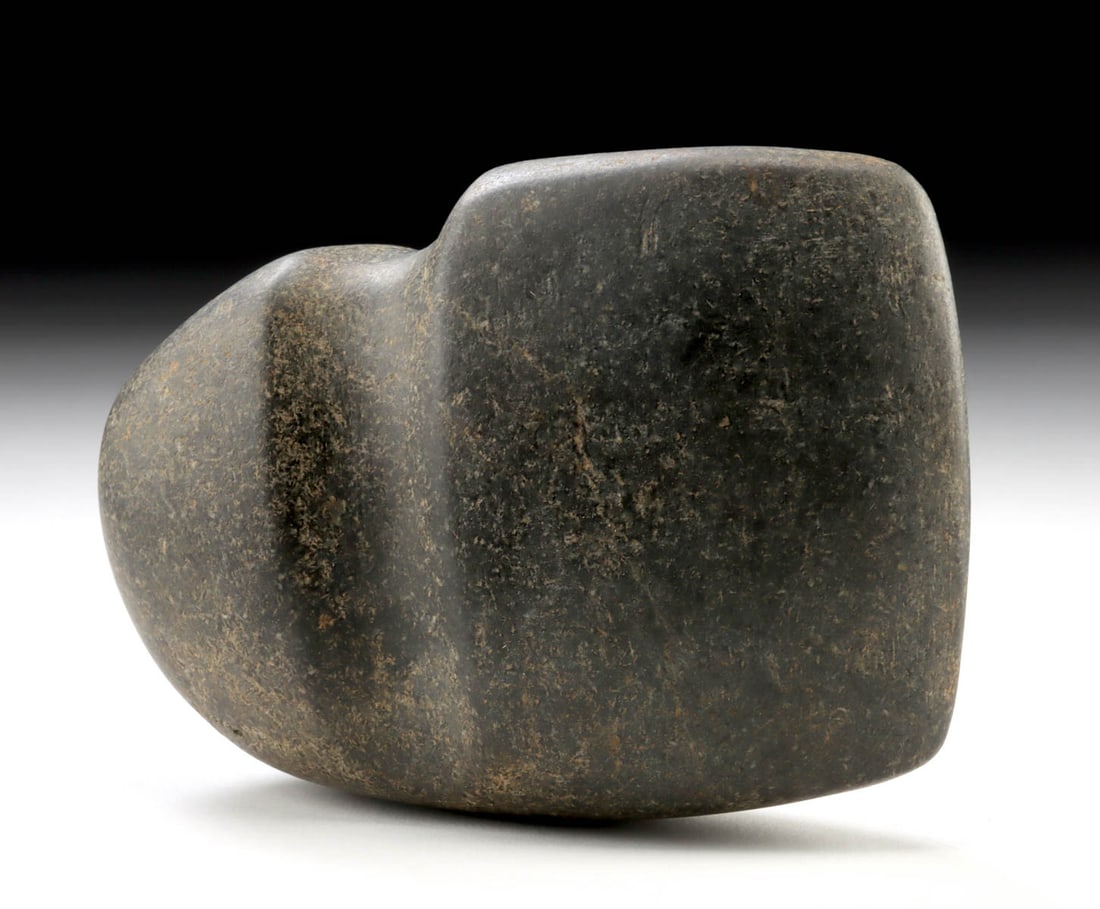 Mississippian Stone Grooved Axe Head - Graves County: Native American, Eastern Woodlands, Mississippian culture, Kentucky, Graves County, ca. 900 to 1400 CE. A hefty and powerfully formed stone grooved axe head, shaped from dense, dark stone and ground t