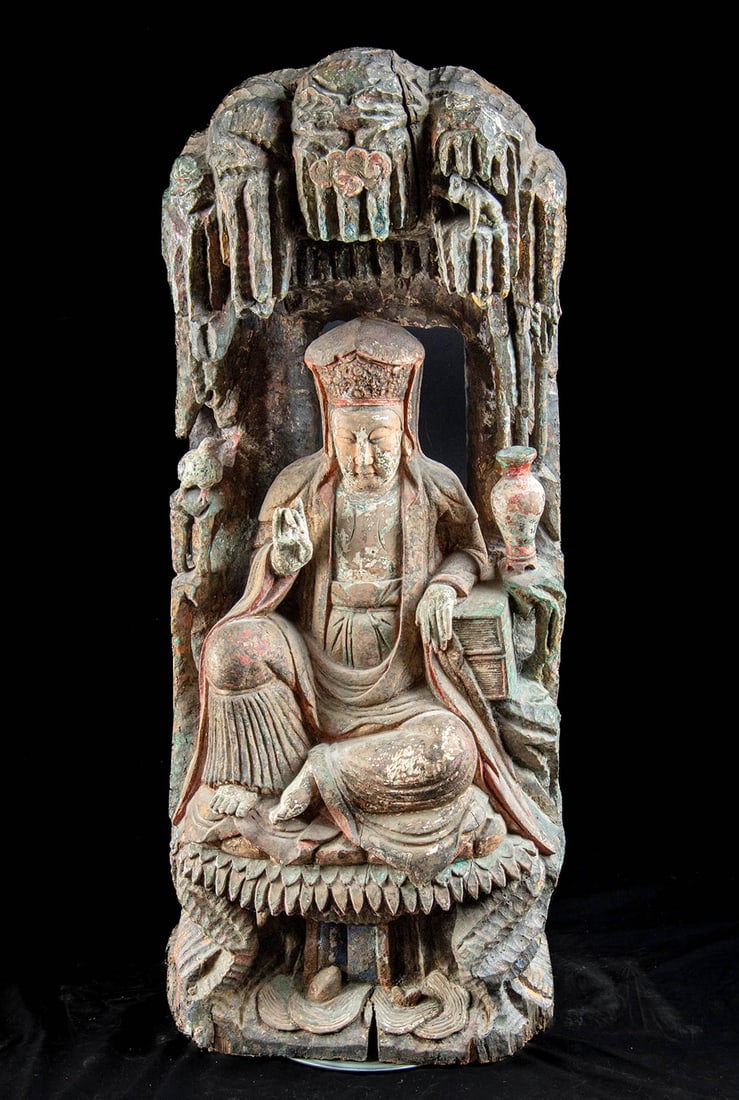 Huge 19th C. Chinese Wood Nanhai Guanyin in Grotto: East Asia, China, Qing Dynasty, ca. 1801 CE. Within the sculpted embrace of her island grotto on Mount Putuo, this painted wooden sculpture unveils Nanhai Guanyin, the compassionate Bodhisattva of the