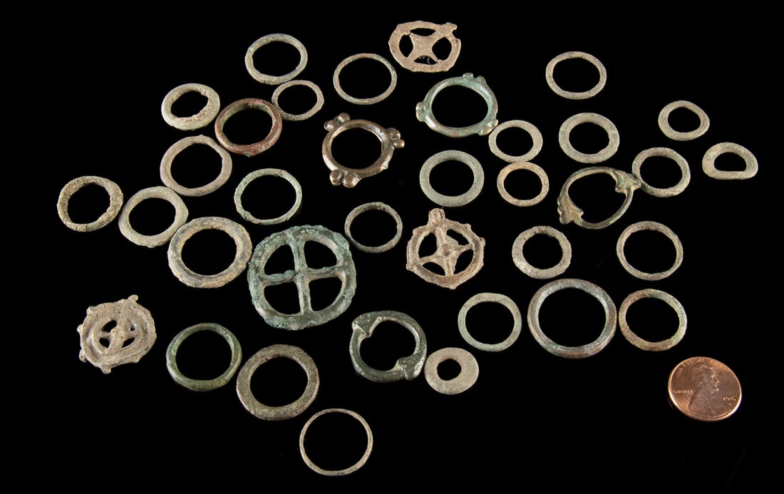Celtic Bronze and Iron Wheel and Ring Coins (35): Western Europe, Celtic, Late Bronze Age to Early Iron Age, ca. 1200 to 400 BCE. A fascinating group of thirty-five Celtic wheel and ring coins, formed in bronze and iron and shaped by a world where mo