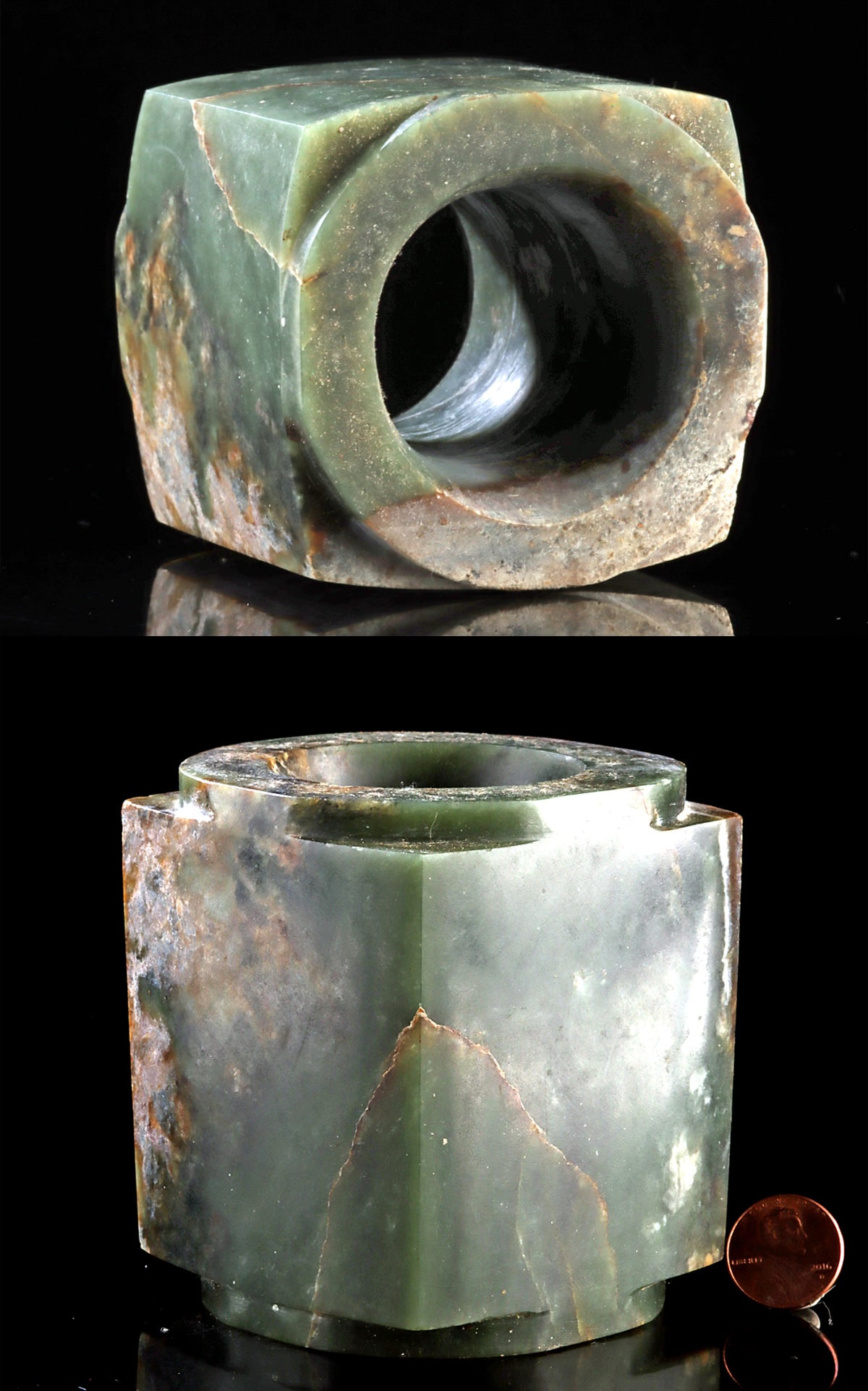 Museum-Exhibited Shang Dynasty Ritual Jade Cong: East Asia, China, Shang Dynasty, ca. 1558 to 1046 BCE. A carved ritual funerary object known as a cong, cut from mottled olive-green nephrite jade with deep forest tones and cloudy pale inclusions. Th