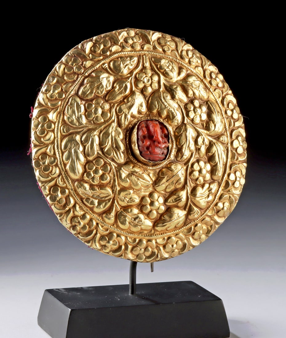 18th C. Himalayan Gold Hair Ornament, Coral Ganesh: Tibet / Nepal, ca. 18th century CE. A luminous masterpiece of Himalayan ceremonial adornment, this exceptional hair ornament is crafted from 56% gold, its surface richly repouss? and chased with scrol