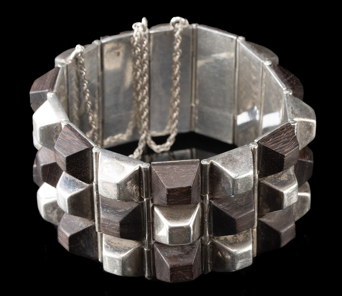 Spratling Sterling Silver & Ebony Pyramid Bracelet: Latin America, Mexico, ca. after 1979 CE. A Spratling sterling silver and ebony bracelet in the pyramid style, composed of fourteen rectangular silver panels with smooth, flat interiors and articulate