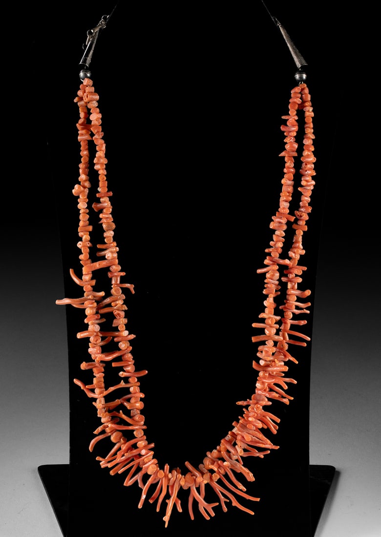 Navajo Branch Coral Bead Necklace w/ Silver Terminals: Native American, Southwestern United States, Navajo, ca. mid to late 20th century CE. A striking double-strand coral necklace composed of natural branch and cut nugget beads in vibrant shades of salmo