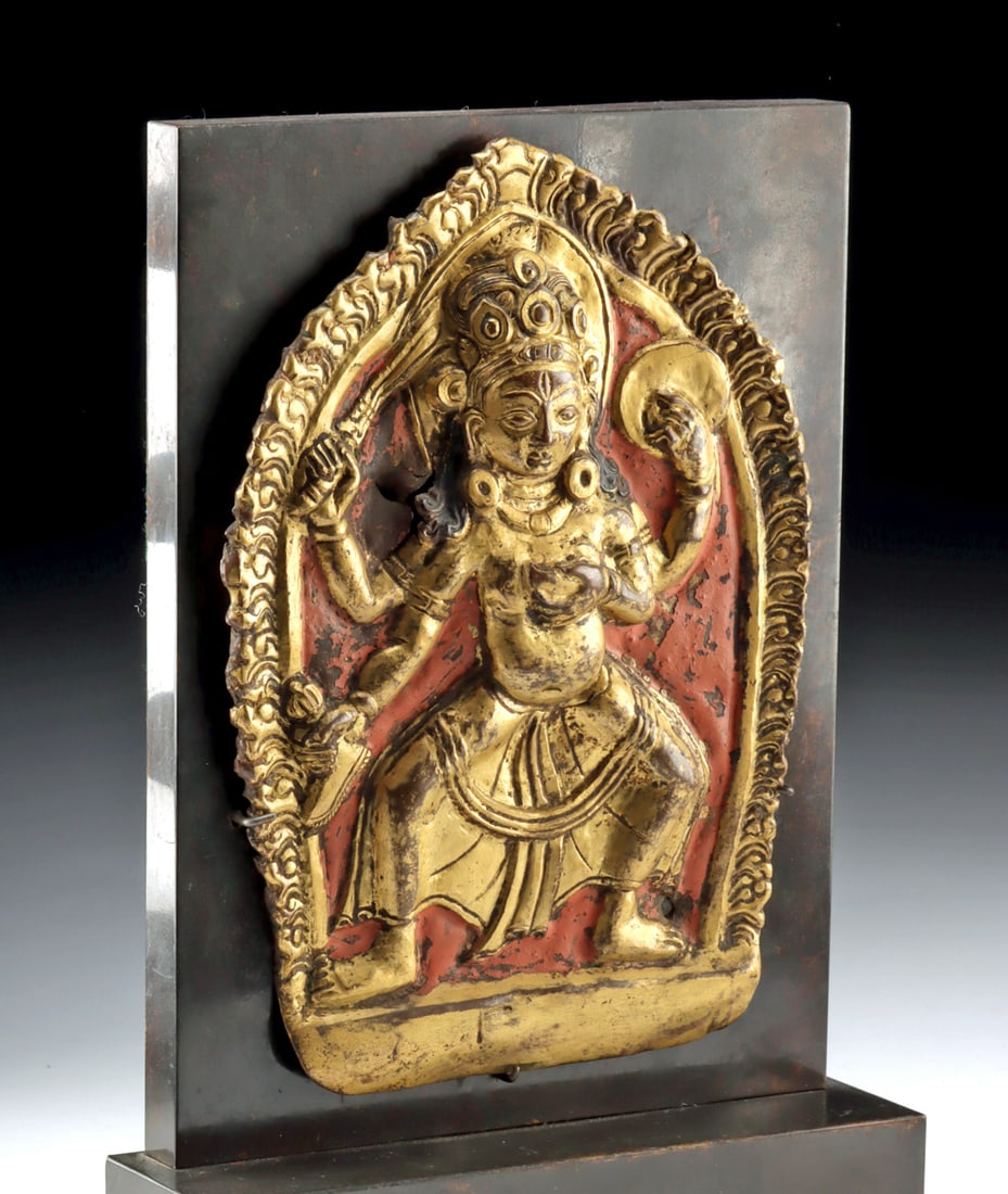 18th C. Tibetan Gilt Repousse Icon of Dorje Phagmo: Tibet, ca. 18 to 19th century CE. An exceptional Tibetan gilt copper repouss? plaque depicting Vajravarahi (Dorje Phagmo), the dynamic tantric goddess revered as the fierce embodiment of wisdom and th