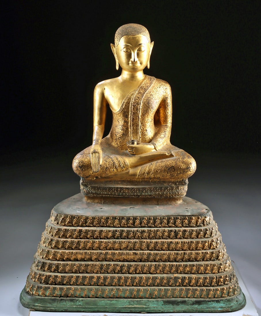 Rare 19th C. Thai Gilt Brass Statue of Monk Phra Malai: Southeast Asia, Thailand, Rattanakosin period, ca. 19th century CE. A gilt brass statue of a monk, likely Phra Malai Kham Luang, distinguished from Buddha statuary by the absence of an ushnisha protub