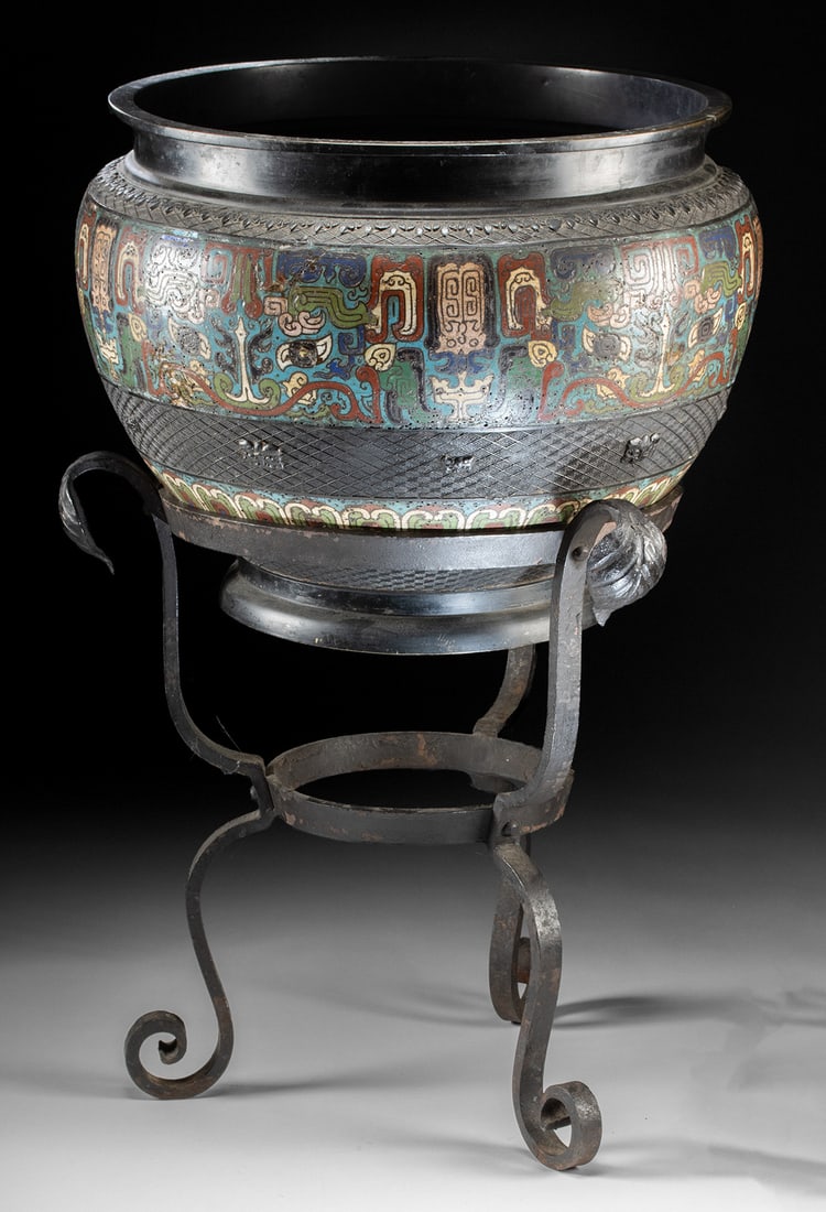Large Chinese Qing Champleve Enamel Brass Brazier Bowl: East Asia, China, Qing Dynasty, ca. 19th to early 20th century CE. A brass champleve leaded-enamel censer or brazier bowl with a broad flaring rim and rounded body, wrapped by a vivid frieze of archai