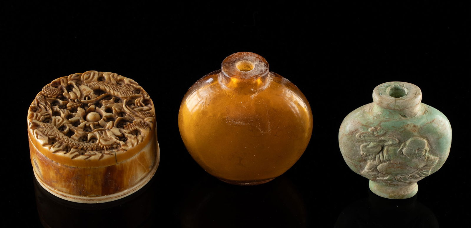 Qing Dynasty Chinese Snuff Bottles & Ivory Box, 3 pcs: East Asia, China, Qing Dynasty, ca. 19th to early 20th century CE. A group of three small containers comprising two snuff bottles and a carved ivory box. One is a translucent yellow glass bottle of ro