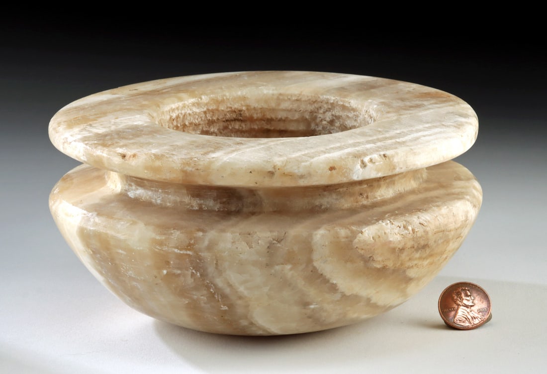 Superb Ancient Bactrian Alabaster Jar: Central Asia, Bactria-Margiana Archaeological Complex (BMAC). Finely carved from a single block of banded alabaster, this substantial vessel exhibits the characteristic proportions and sculptural weig