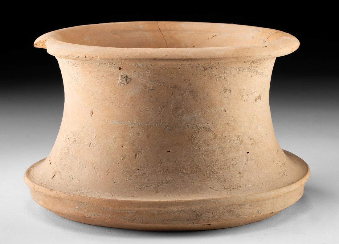 Large Romano-Egyptian Terracotta Vessel Stand: Romano-Egyptian, Imperial period, ca. 1st to 3rd century CE. A rare and imposing Romano-Egyptian terracotta vessel stand, this large architectural form was made to elevate and stabilize jars and round