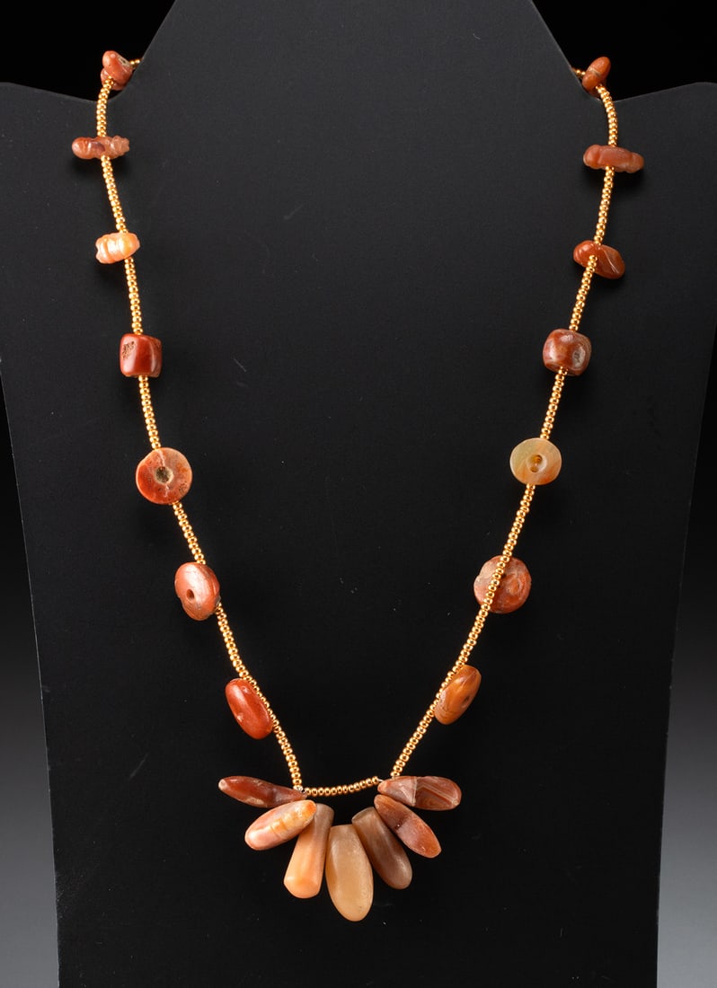 Ancient Multi Culture Carnelian & Agate Bead Necklace: Pre-Columbian, Colombia, Sinu (Zenu) or Tairona culture, ca. 1000 to 1500 CE, and Near East, Mesopotamia to Egypt, New Kingdom to Roman period, ca. 1550 BCE to 1000 CE. An assemblage necklace formed